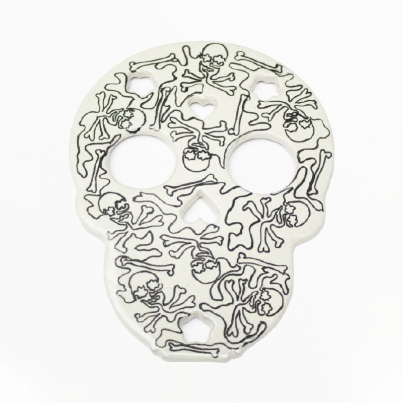 Placa de calavera para colgar en pared.